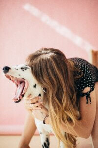 hugging dog